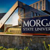 Morgan State University campus sign with modern building architecture against blue sky