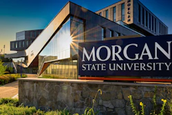 Morgan State University campus sign with modern building architecture against blue sky