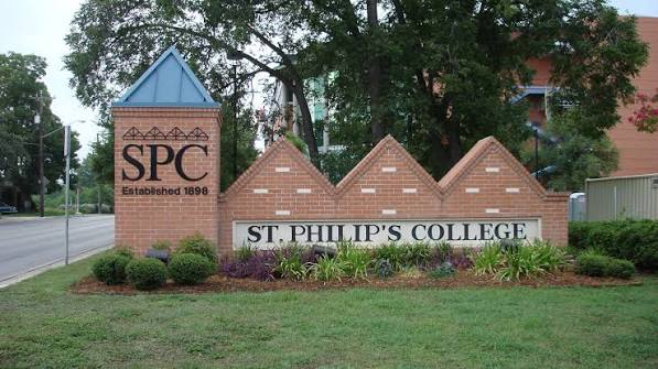 St. Philip's College entrance sign with brick pillars, established 1896, featuring SPC logo and landscaping