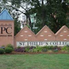 St. Philip's College entrance sign with brick pillars, established 1896, featuring SPC logo and landscaping