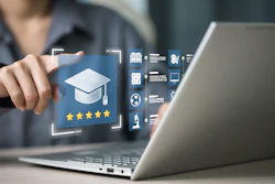 Person pointing at holographic education interface with graduation cap icon and five-star rating on laptop screen